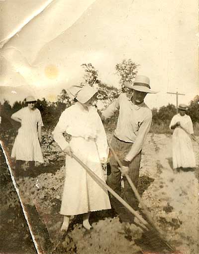 Forrest and Sadie
                Hoeing in Arkansas